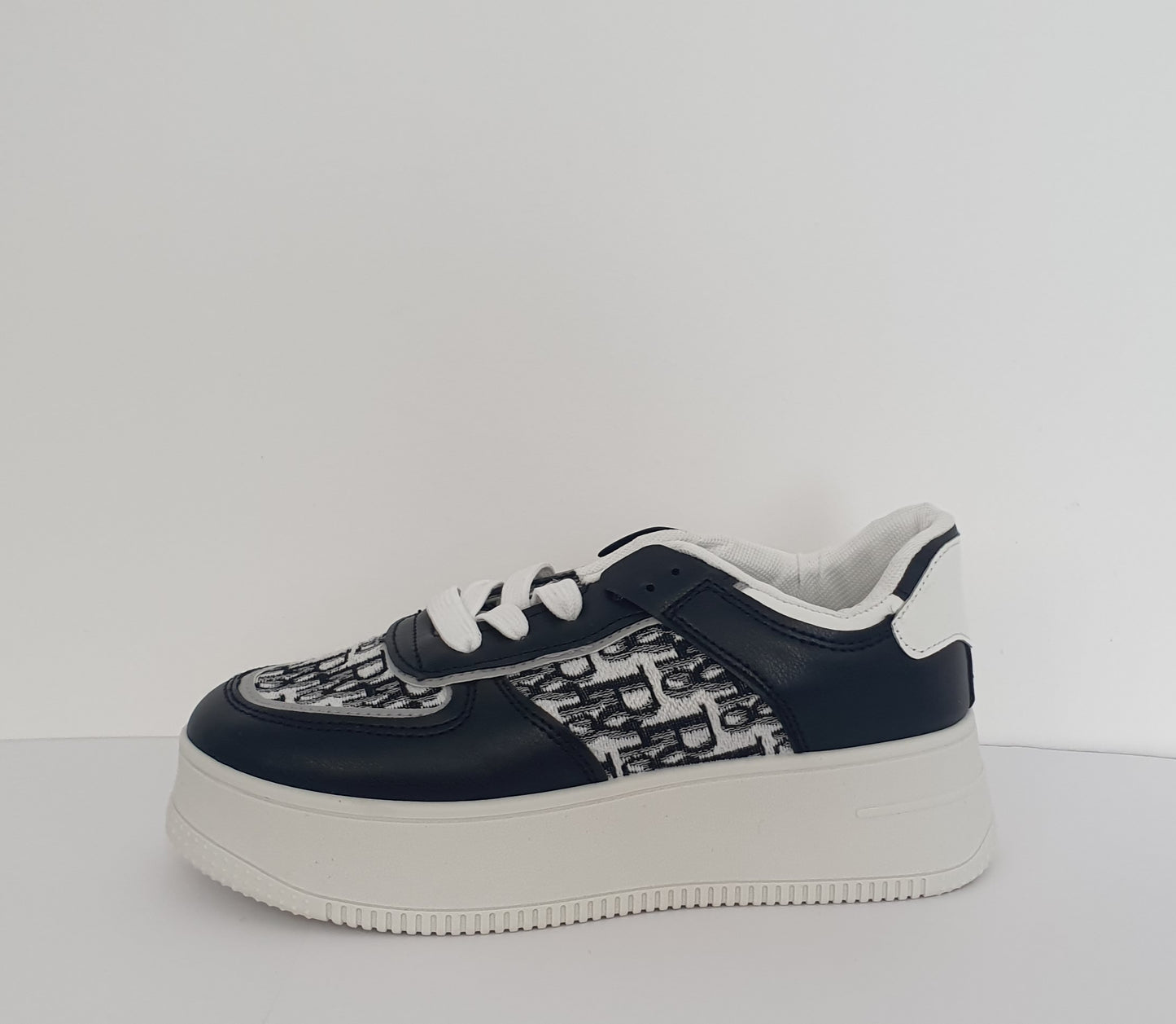 Black and White D Design Platform Trainers
