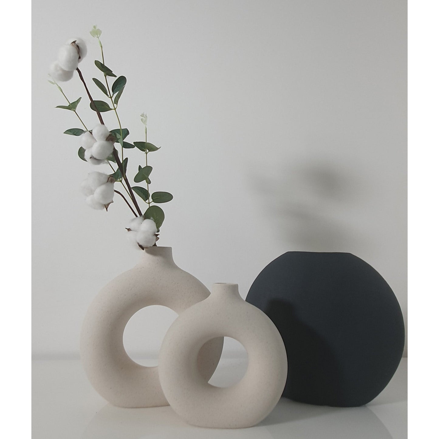 Dark green ceramic oval vase