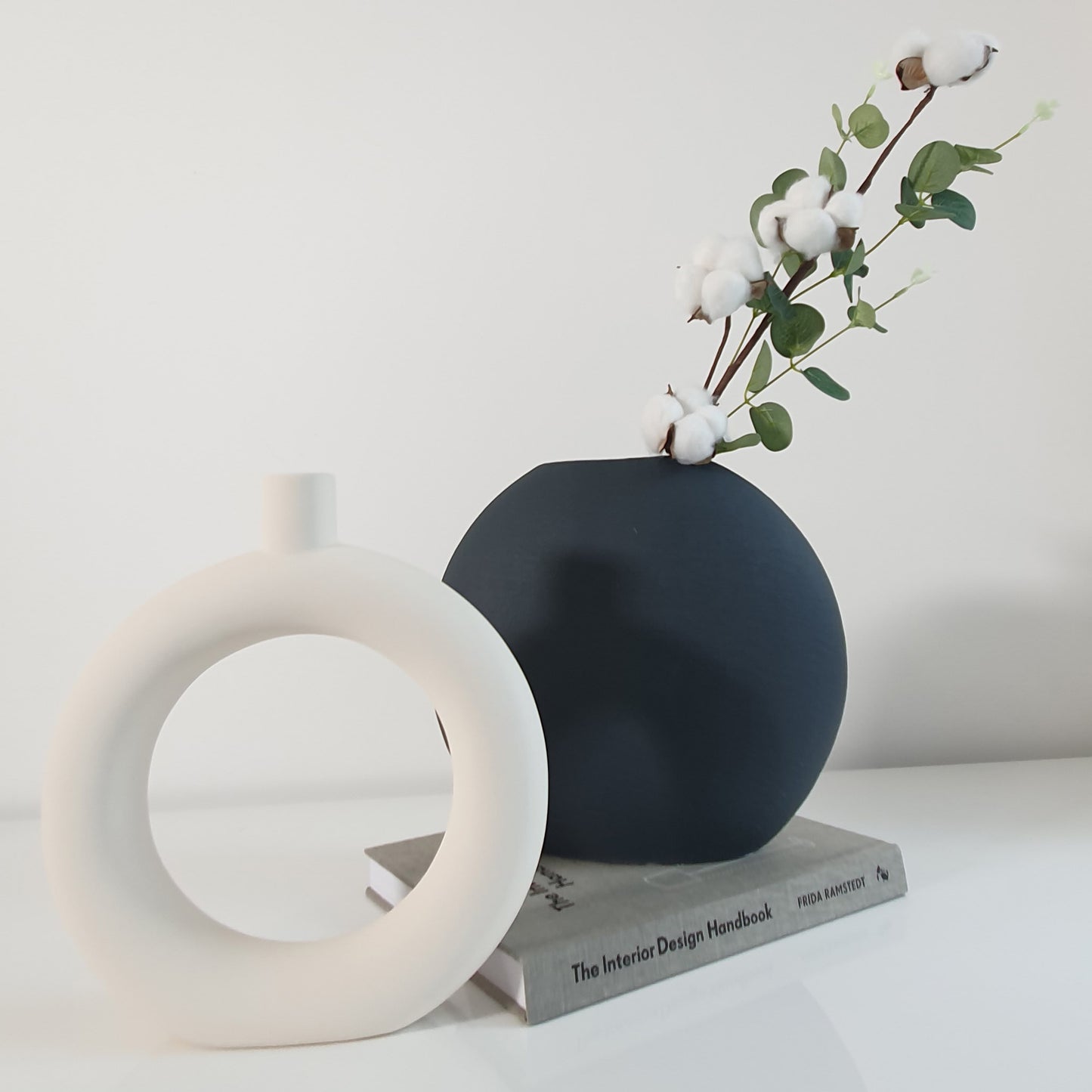 Dark green ceramic oval vase